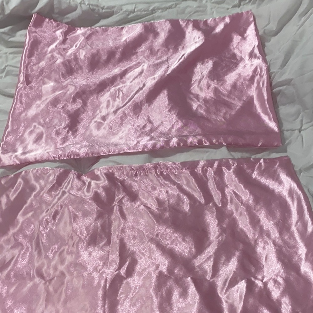 NWOT. Queen size set of pink satin pillow case